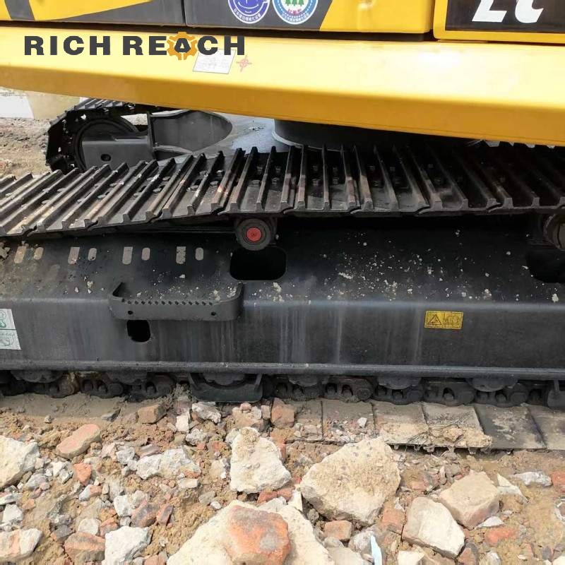 Equipment nameplate and hour meter of a 2018 Komatsu PC210 excavator priced at $30,556